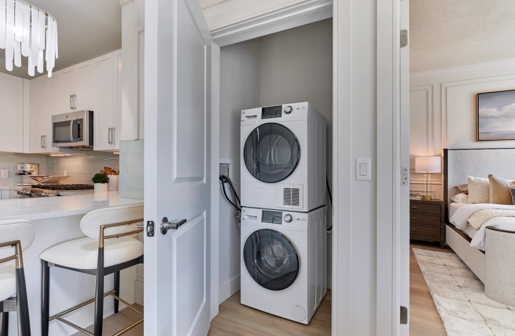 Liora residence laundry closet between the kitchen and bedroom